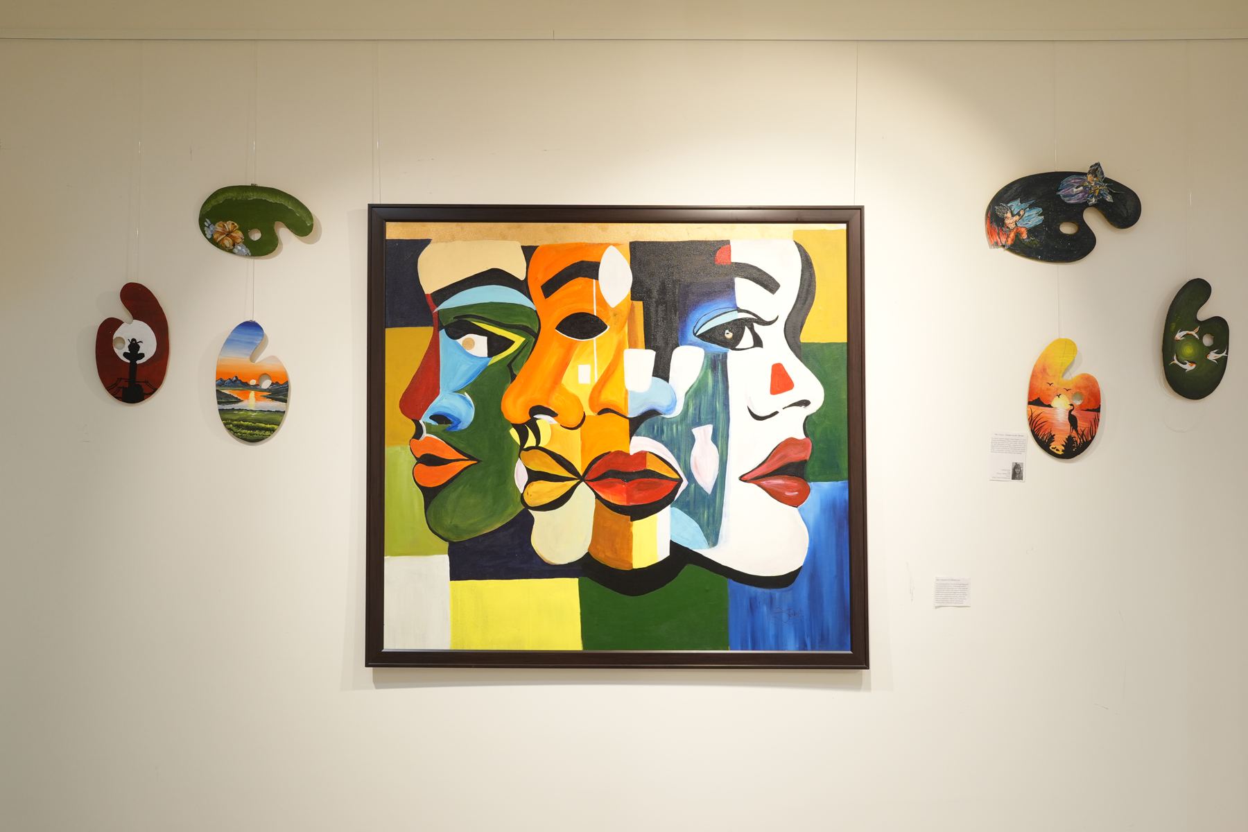 Student paintings on display in the TSLAS Art Gallery